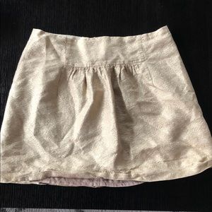 Gold mini skirt
